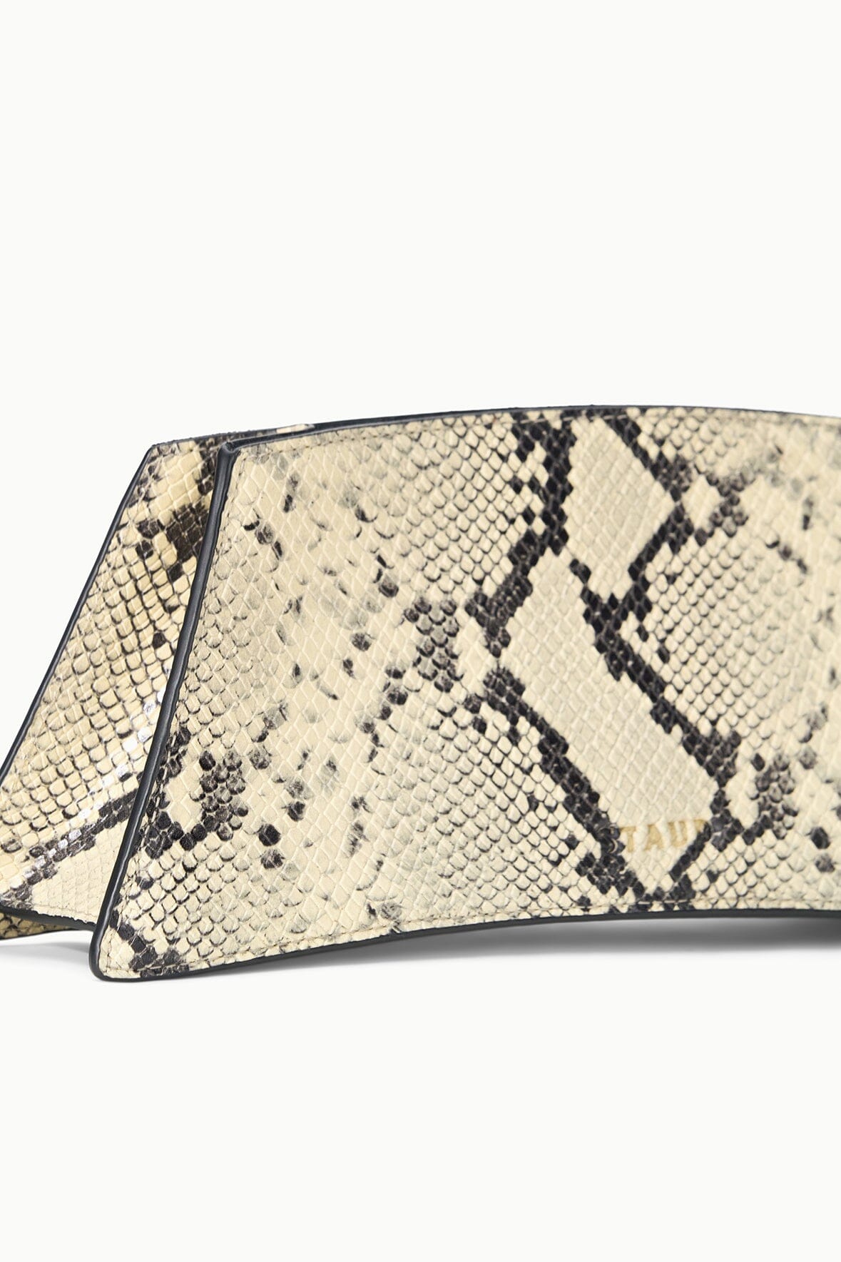White snake-pattern shoulder bag close-up with zipper and top edge trim