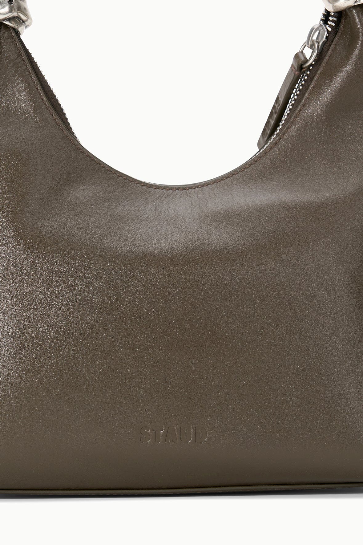 Truffle brown shoulder bag with embossed STAUD logo on front panel