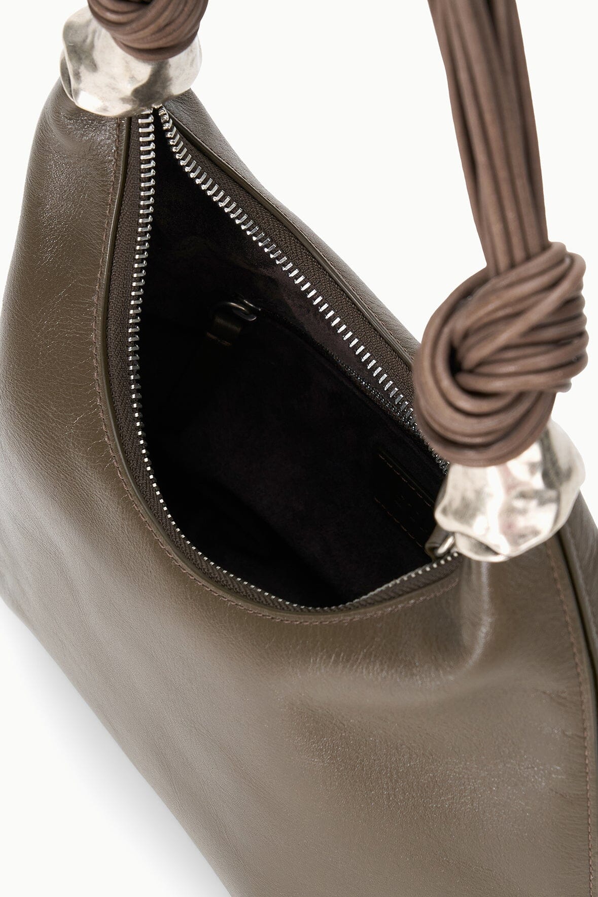 Truffle brown shoulder bag with zip opening, dark lining, braided handles, silver hardware