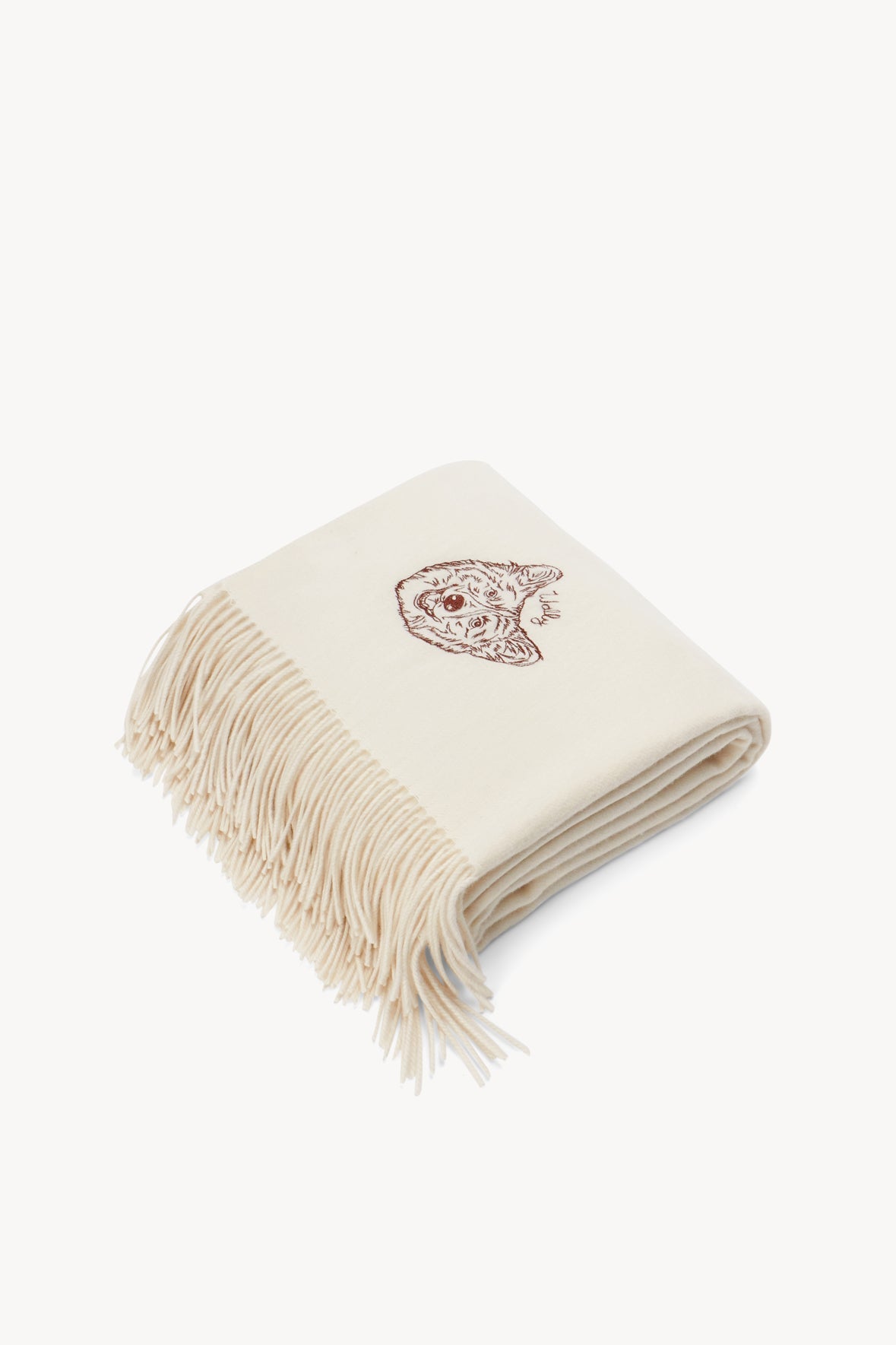 Ivory cashmere blanket with fringed edge and embroidered dog face