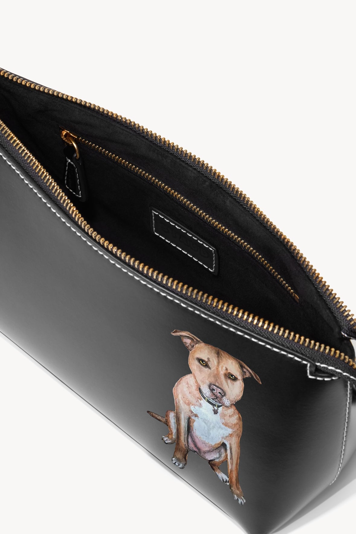 Black Kaia bag interior with zipper track and stitched pocket panel