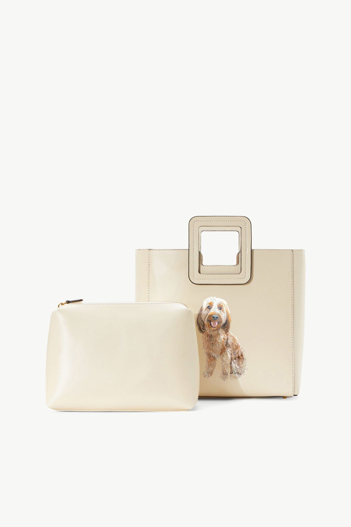 Cream leather tote with matching zip pouch and pet portrait patch.