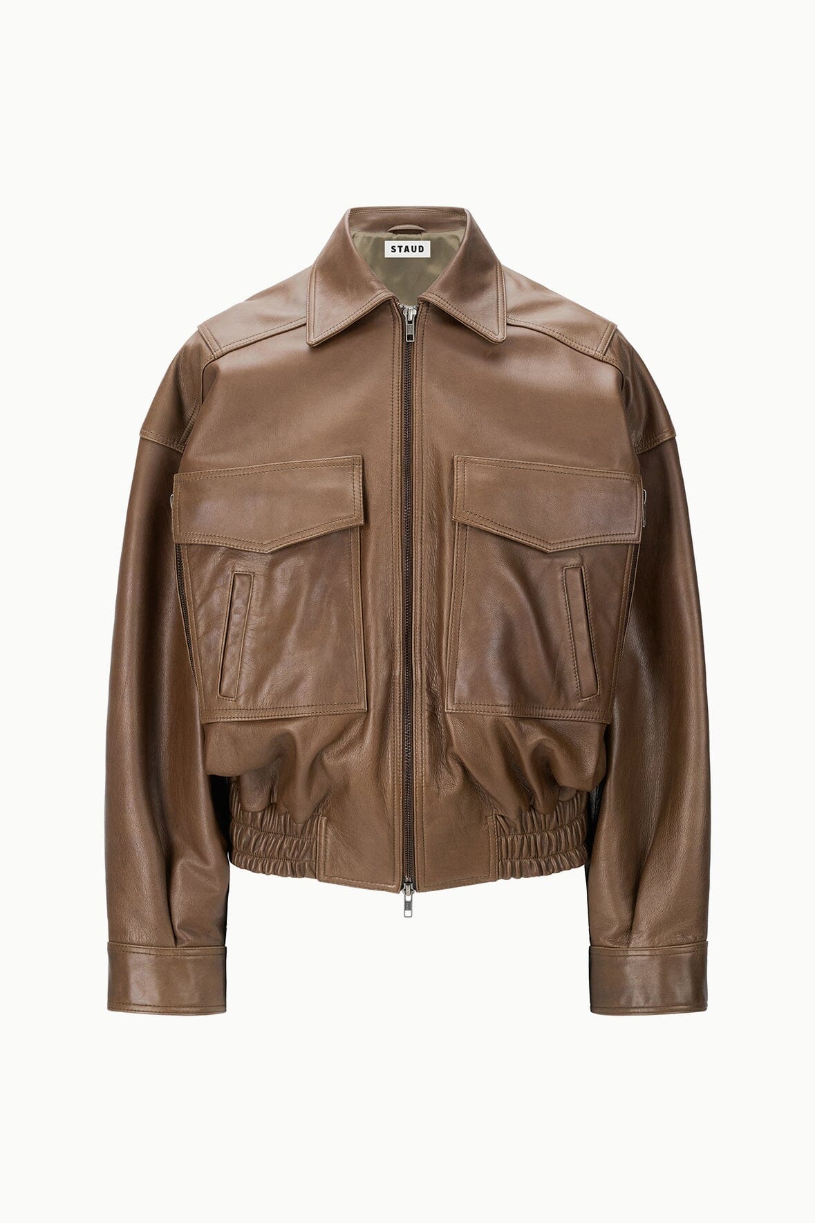Brown leather cropped bomber jacket with zip front and double flap pockets