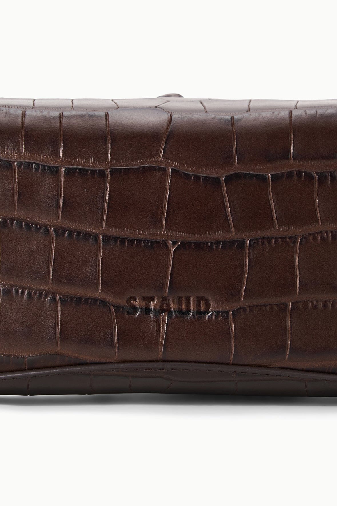 Espresso croc-embossed clutch close-up with top edge and stamped logo