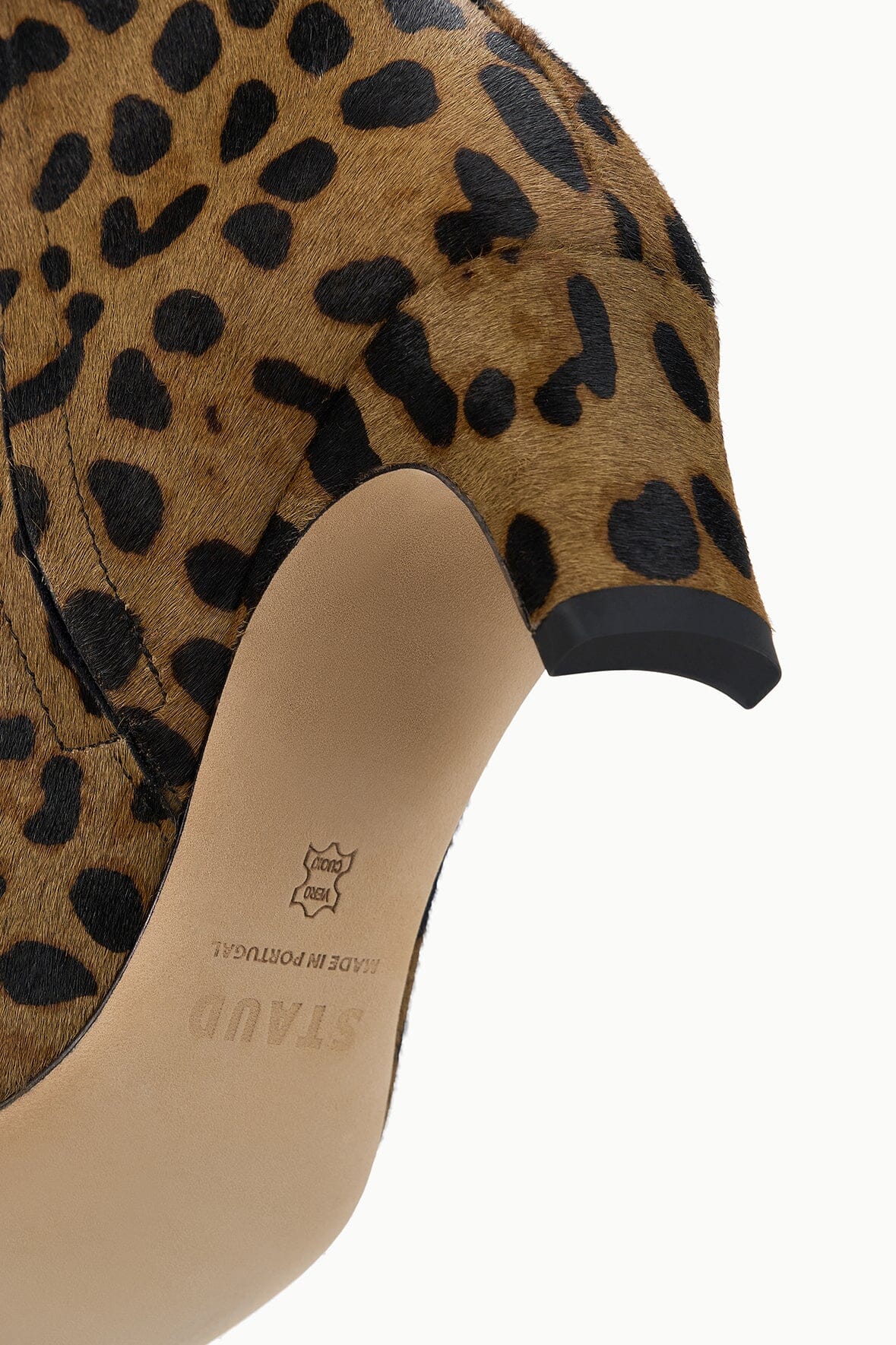 Cheetah-print ankle boot interior and heel detail with low block heel