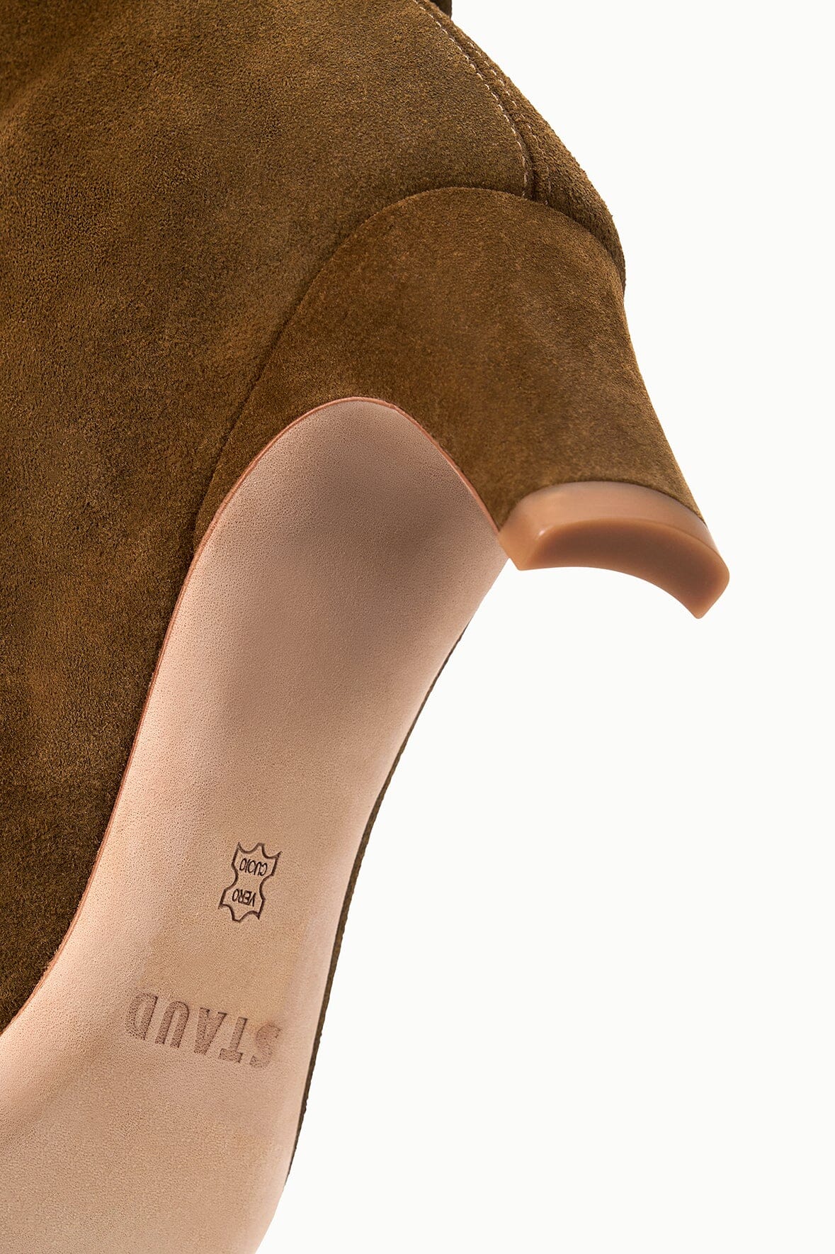 Cigar-brown suede slouch boot with printed insole logo near heel opening