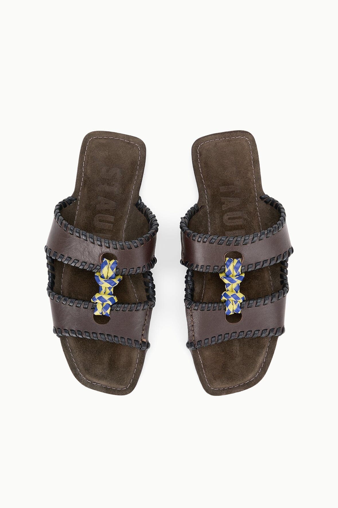 Espresso-brown slide sandals with braided straps and blue-yellow knot detail, pair