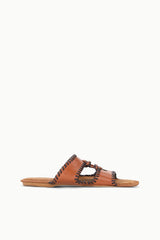 Tan leather slide sandals with braided cutout straps and flat sole