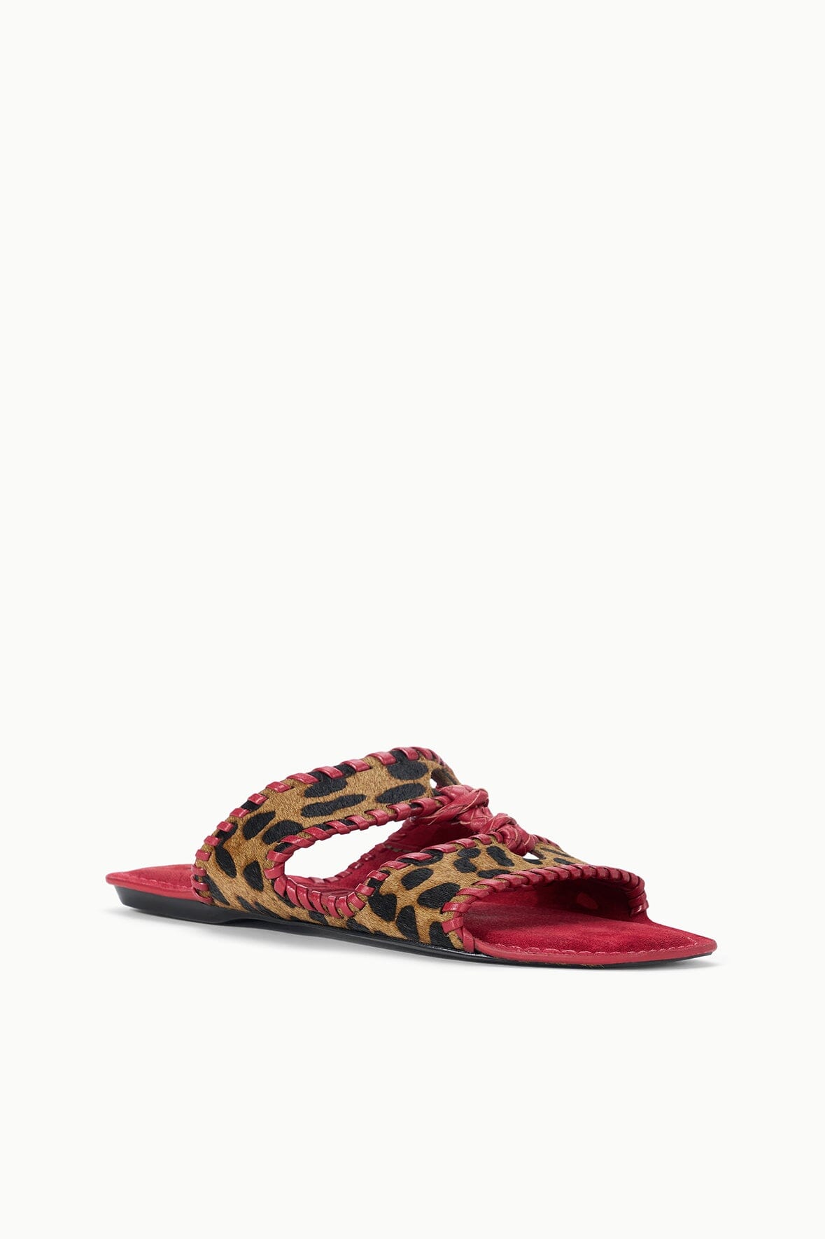 Cheetah-print slide sandal with red sole and crisscross woven strap