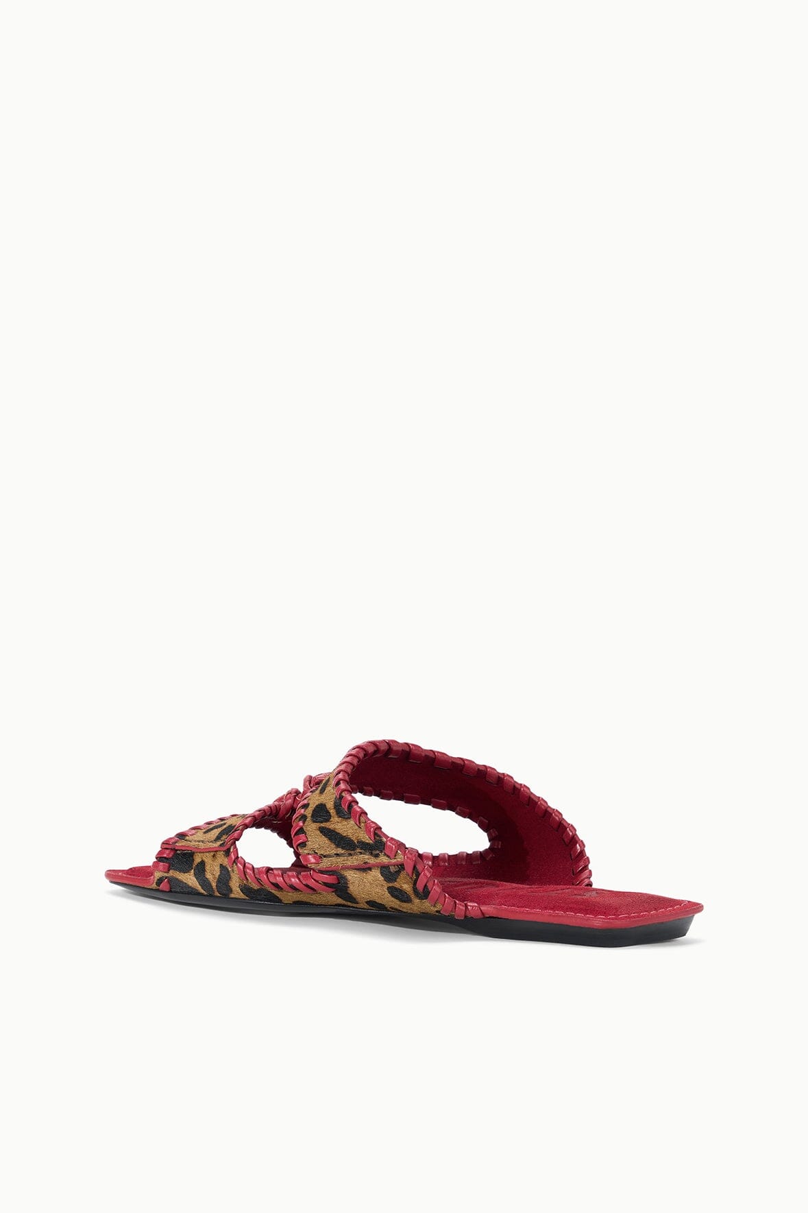 Cheetah-print slide sandal with red footbed and braided strap across the top