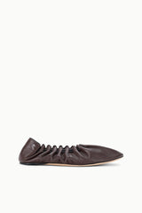 Espresso-brown flat shoe, single side view with gathered upper