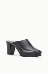 Black leather mule clog with block heel, angled side view