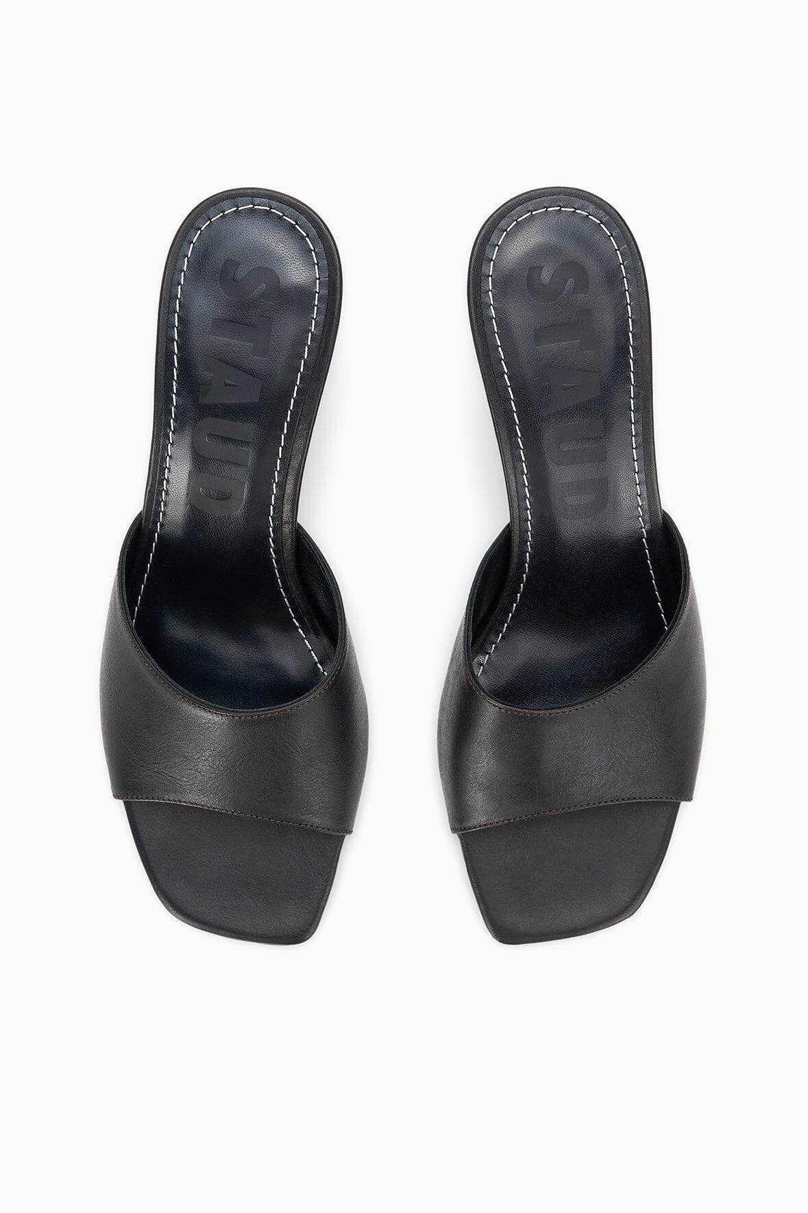 BEA mule espresso distressed: black slip-on mules with open toe, front view of pair