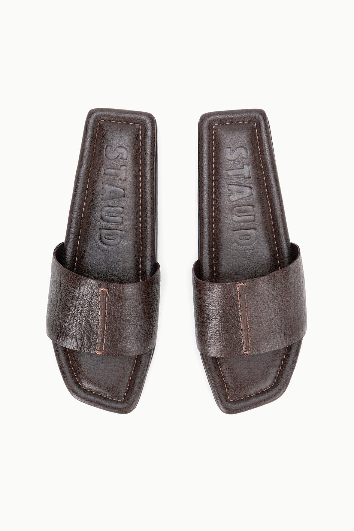 Espresso brown platform slide sandals with contrast stitching on wide band straps