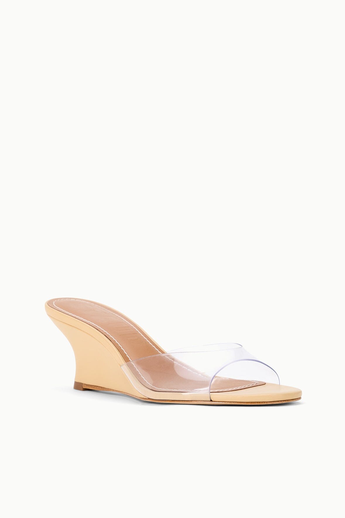 BRIGITTE wedge slide sandal, tan wedge heel with clear toe strap, angled side view
