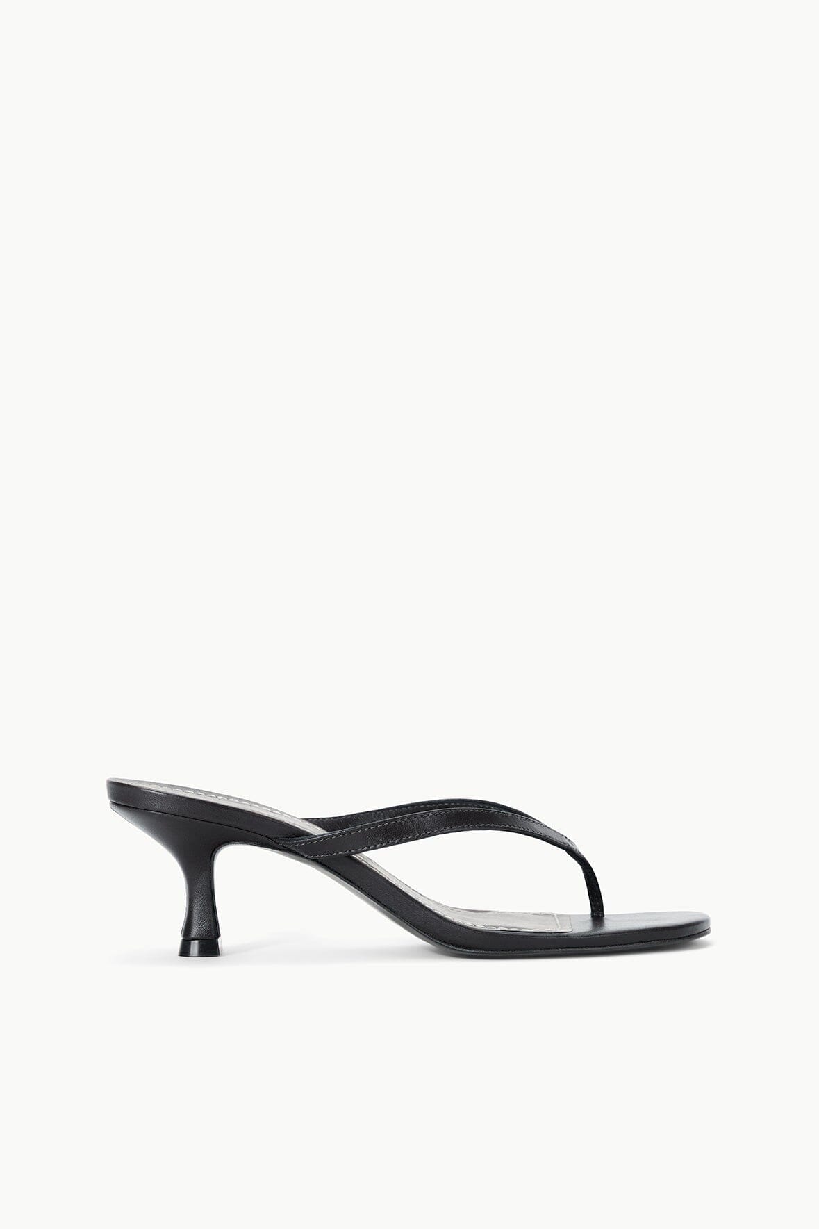Black slim-heel strappy sandals with open toe and curved cross straps