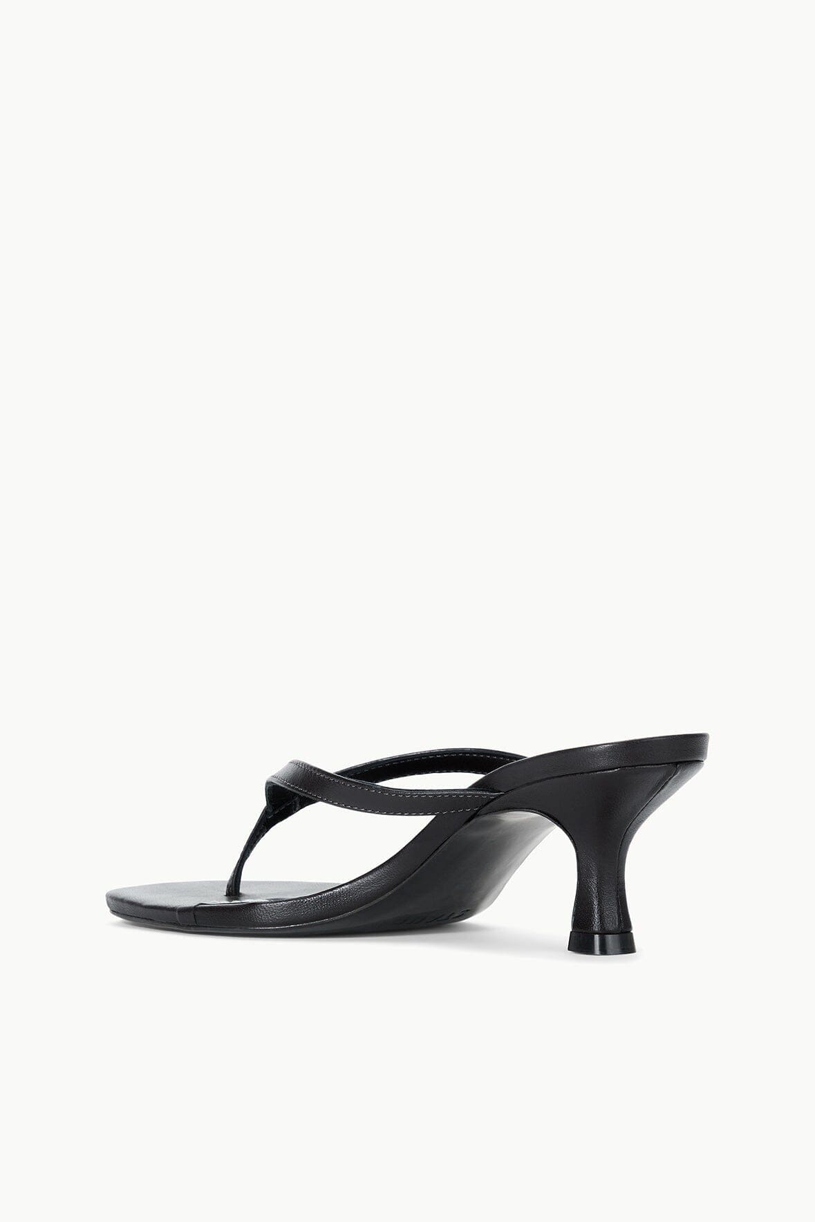 Black strappy kitten-heel sandals with open toe and side thong strap