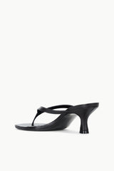 Black strappy kitten-heel sandals with open toe and side thong strap
