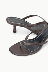 Espresso leather thong sandals with stitched cross-strap and kitten heel