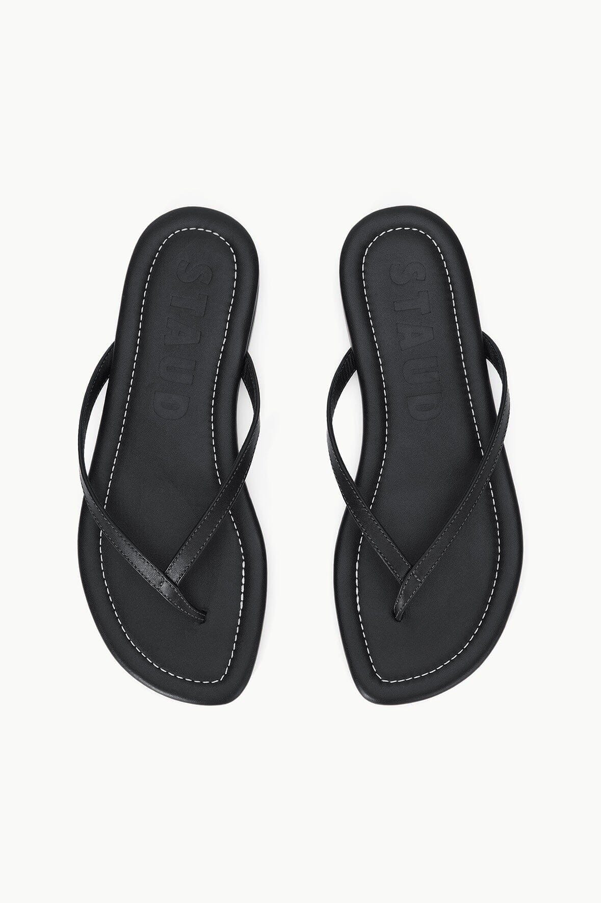 Pair of black thong sandals with stitched V-shaped straps