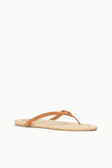Tan woven thong sandals with slim cross toe strap and flat sole
