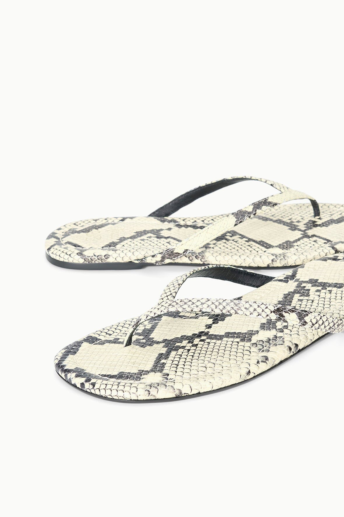 Snake-print thong sandals with crossing straps and black thong sole