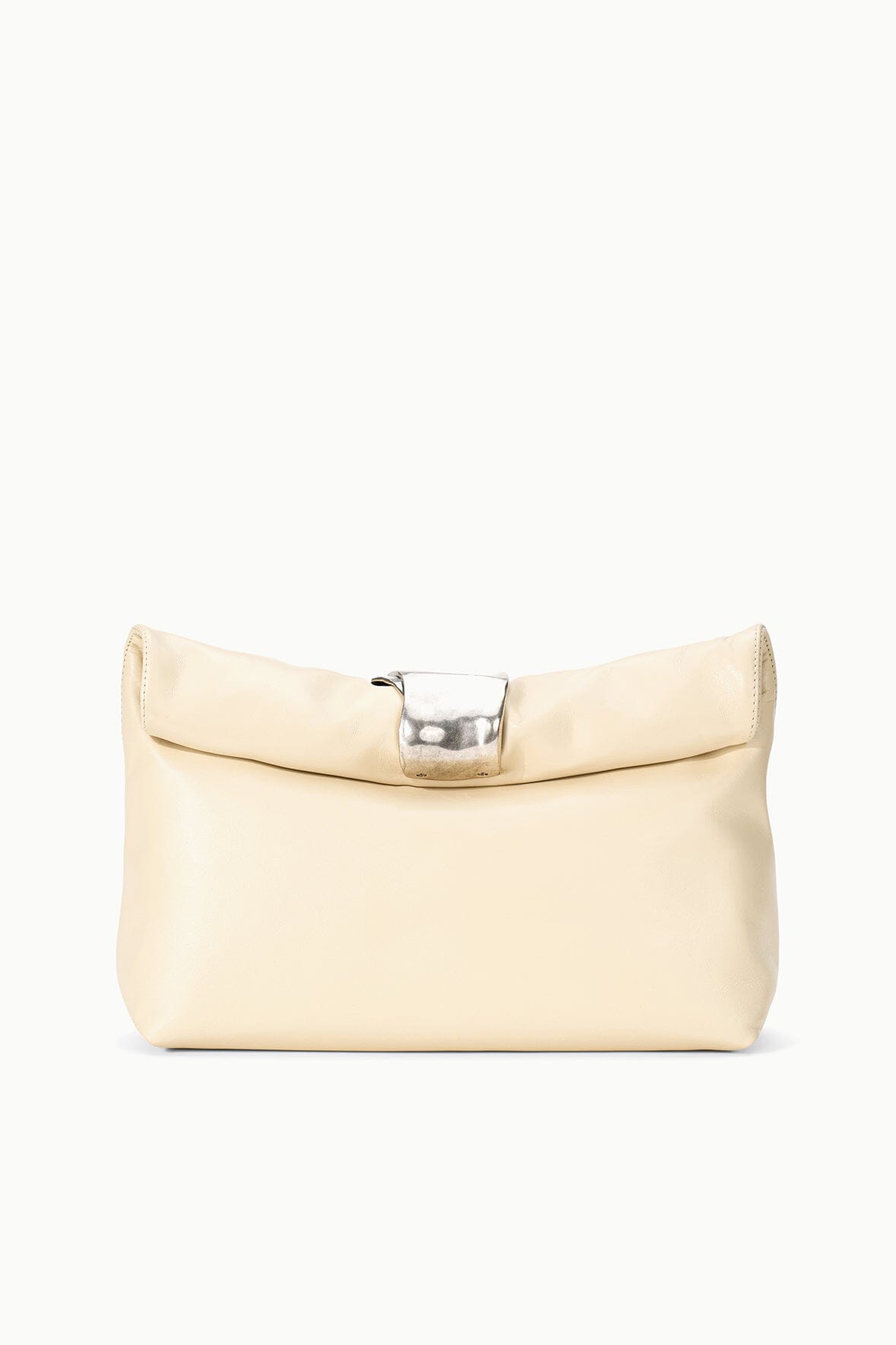 Cream cuff clutch with curved front flap and silver clasp, side shoulder strap.