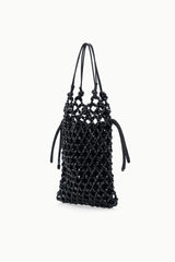 Black beaded tote bag with drawstring-style knotted handles and slim silhouette
