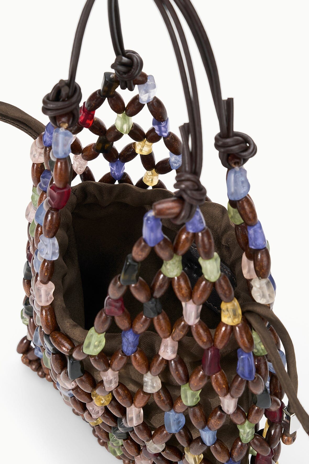 Beaded tote bag with open top, dark interior, and multicolor oval beaded trim