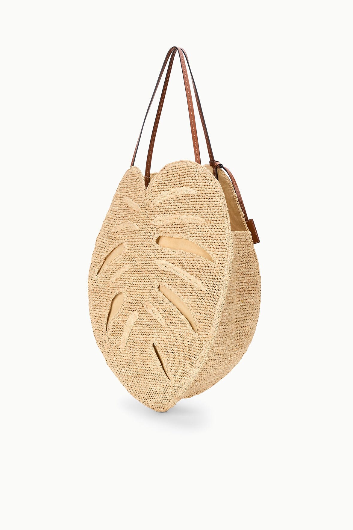 Large natural raffia palm leaf tote bag with brown leather handles and side pocket