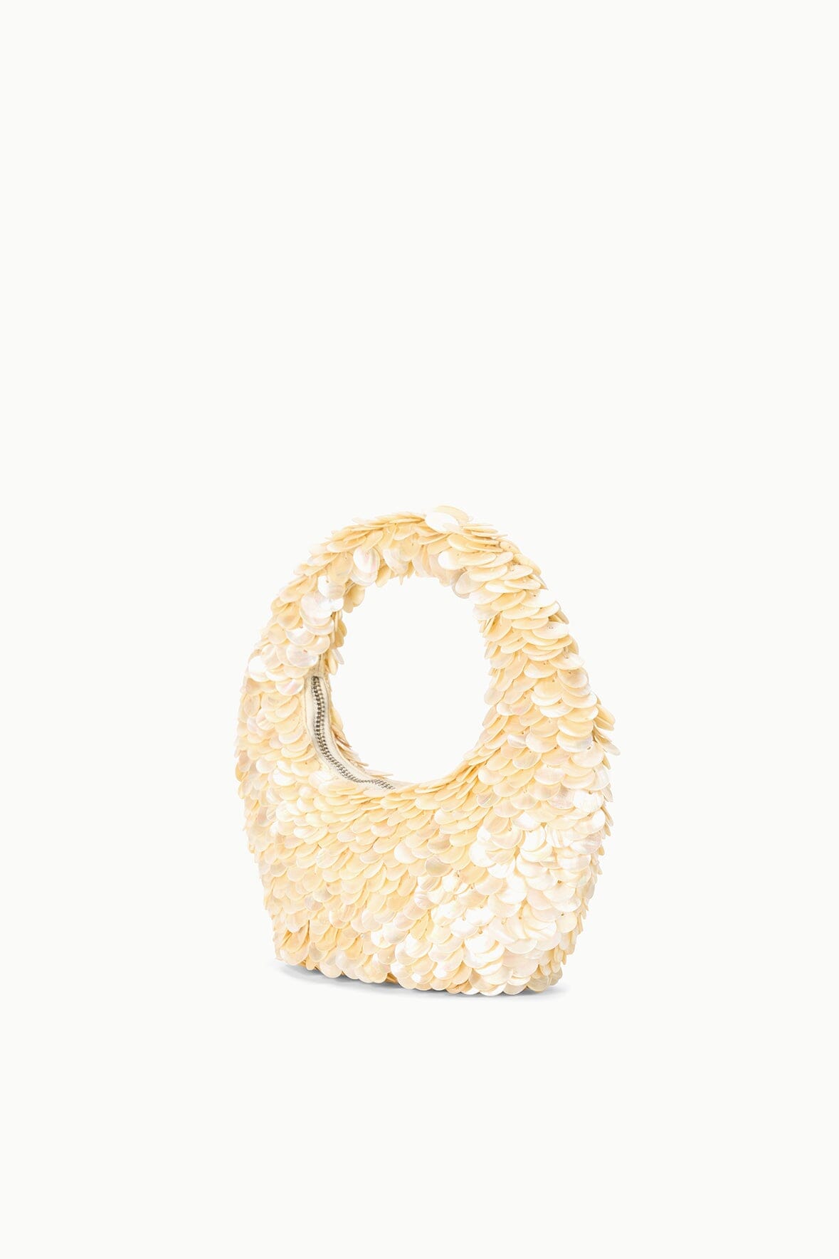 Cream sequined tote bag with handle, all-over scallop texture.
