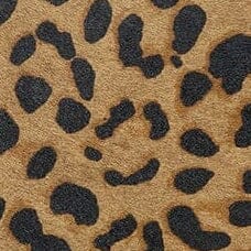 Cheetah-print fabric detail on OLLIE bag with dark spots on tan background