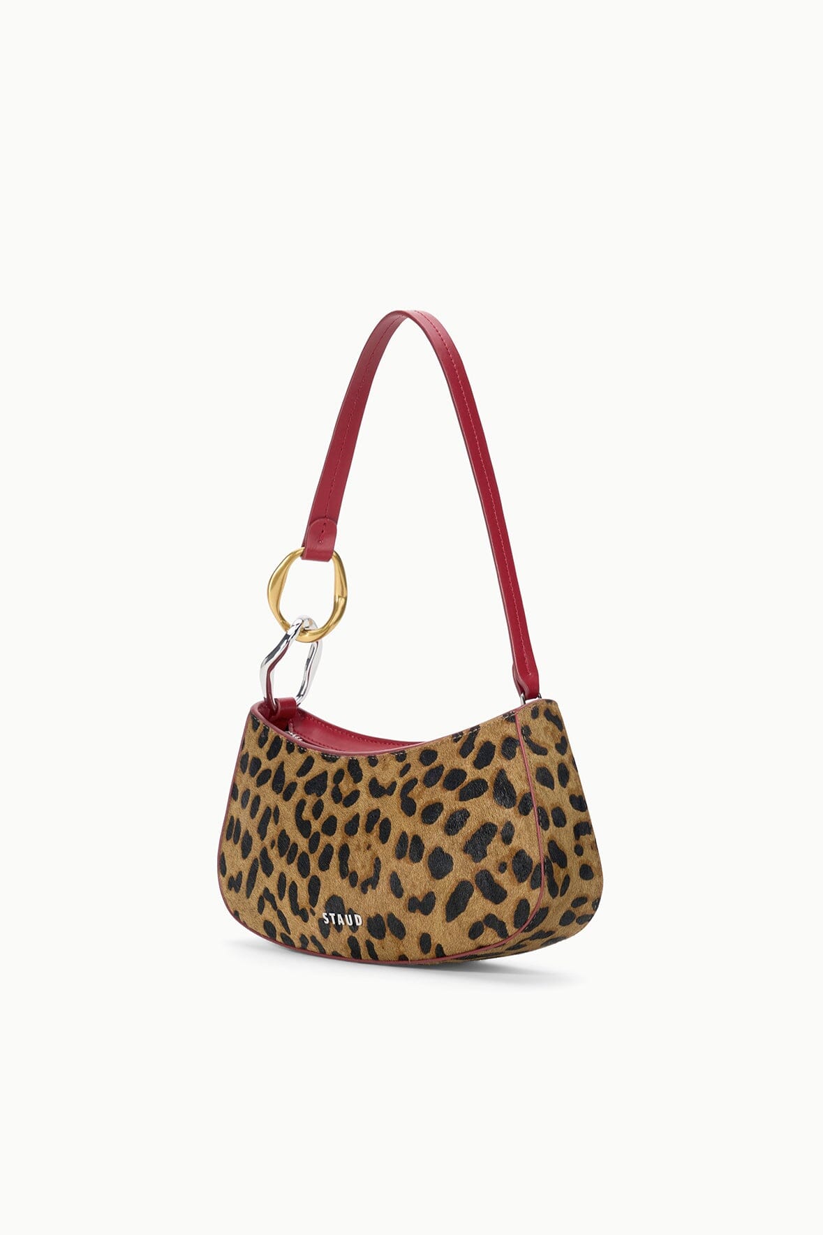 Cheetah-print shoulder bag with burgundy strap, gold ring hardware, compact shape