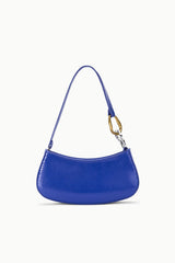 Cobalt blue textured hobo handbag with curved silhouette and gold hardware