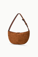 Tabac suede shoulder bag interior showing zip pocket and dark lining