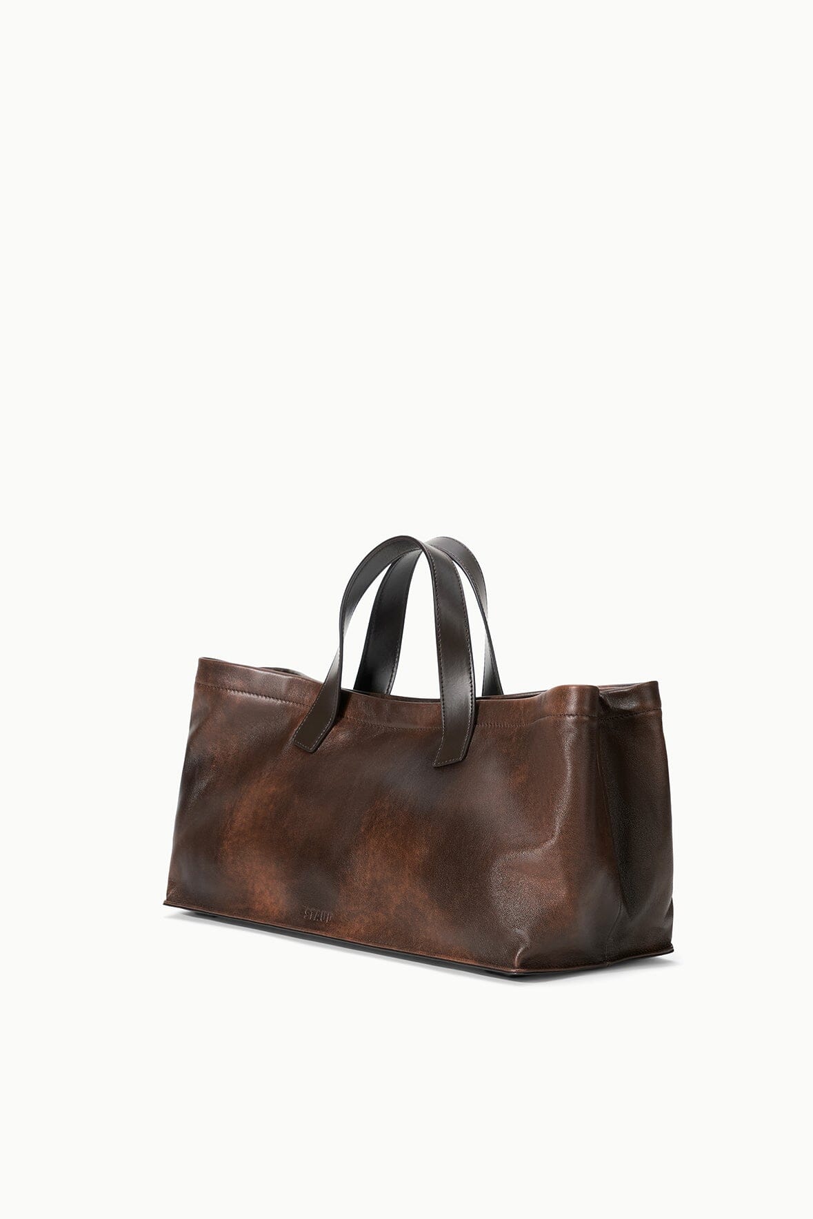Espresso-brown distressed leather port tote with top handles, structured shape