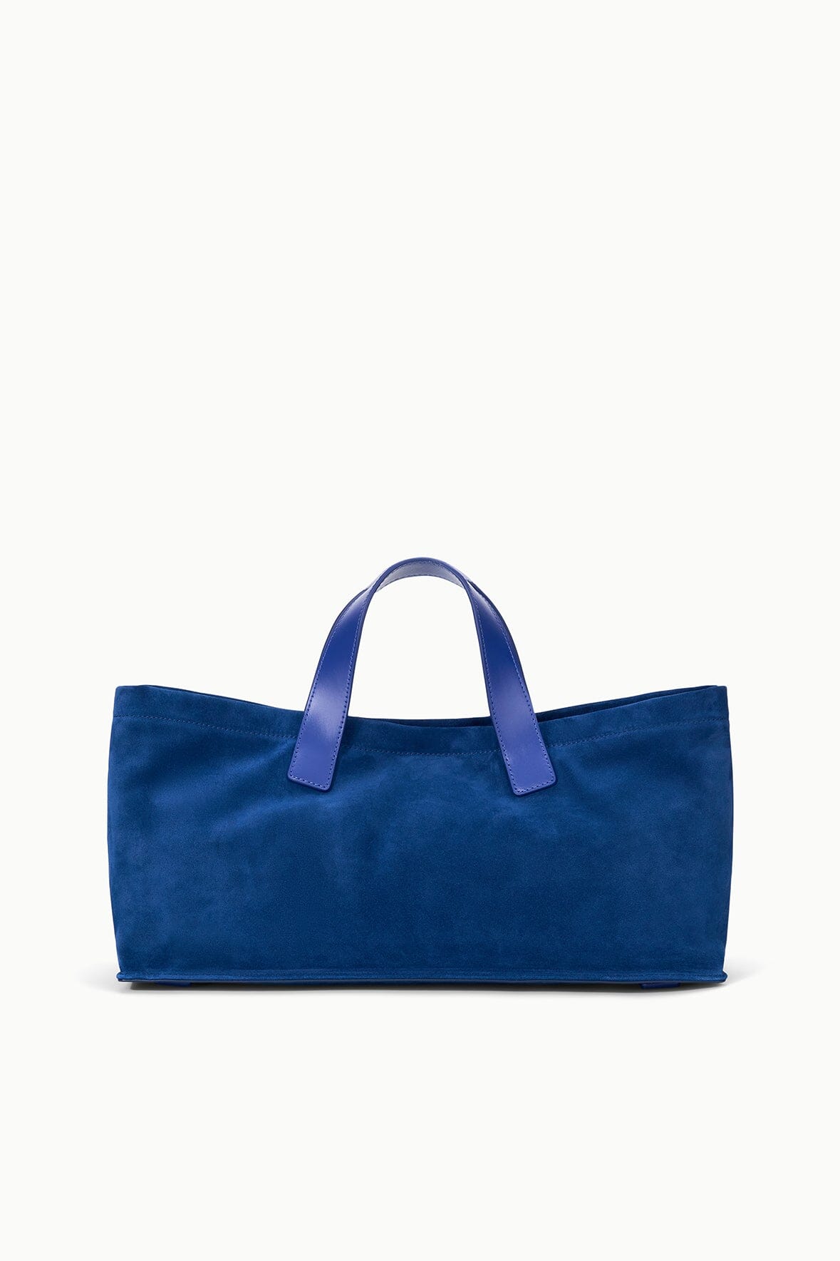 Cobalt blue port tote with two short handles, flat base and open top