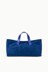 Cobalt blue port tote with two short handles, flat base and open top