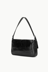 Black leather shoulder bag with adjustable strap and flap closure