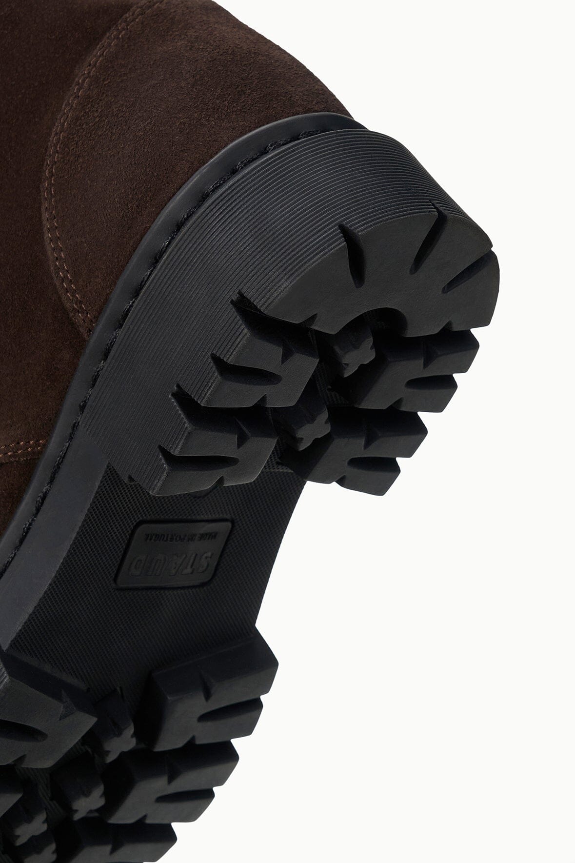 HENRY combat boot lug tread outsole close-up in dark rubber
