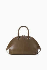 Truffle brown rounded satchel with two top handles and central seam.