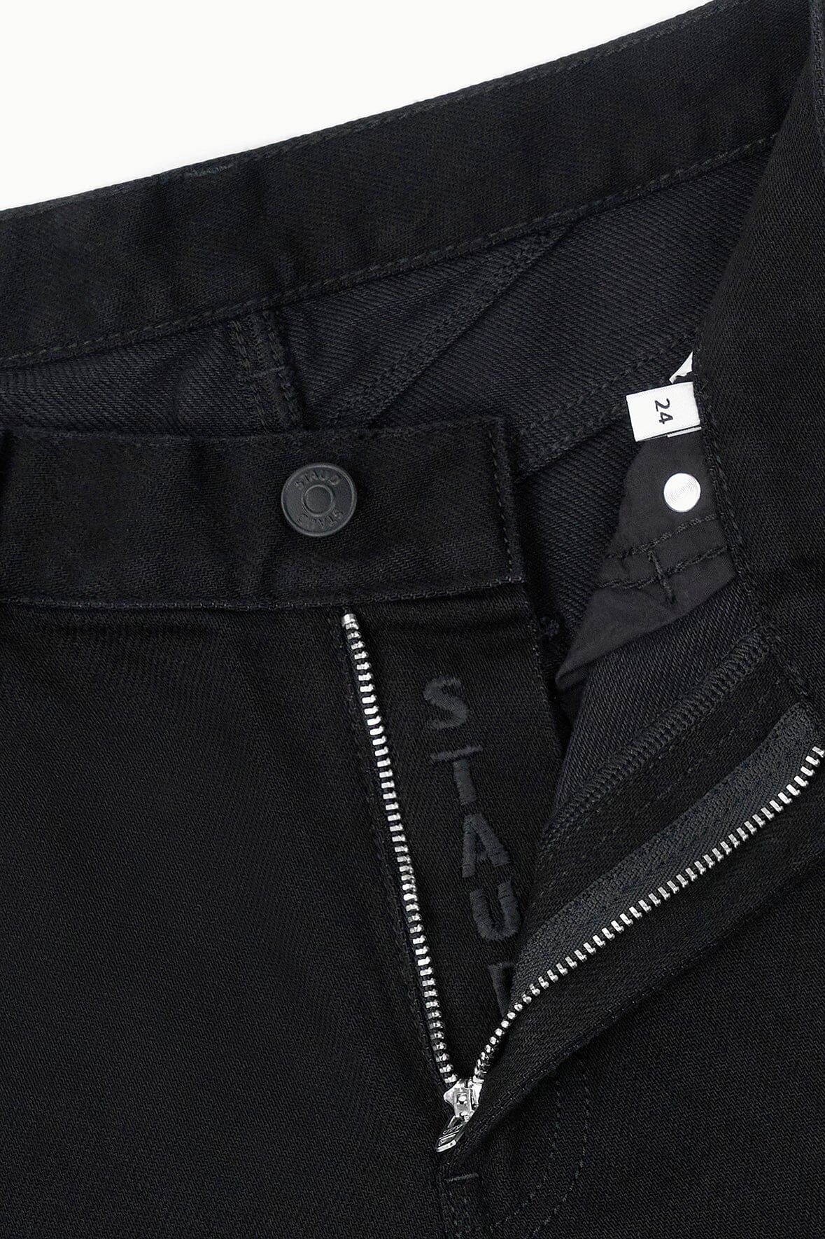 Black barrel jeans with zip fly and front pocket detail