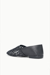 Black woven flat loafer with leather back panel and low block heel