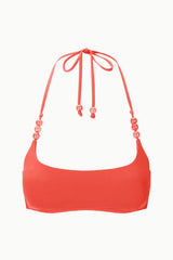 Coral red bikini top flat lay with beaded halter cords and adjustable center tie