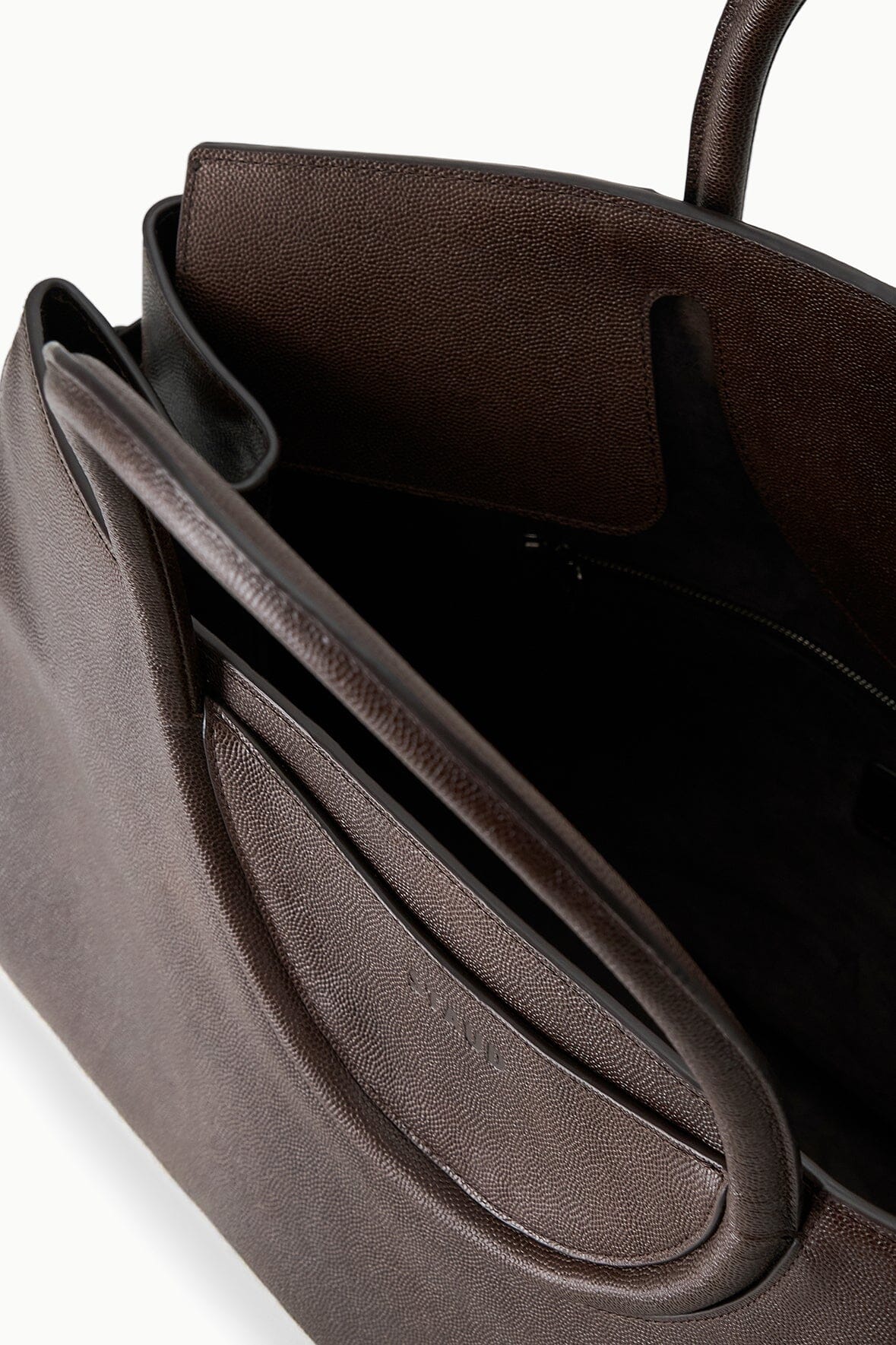 Large Maude carryall bag interior view with two zip pockets and structured opening
