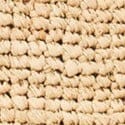 Tan raffia weave texture detail on a moon tote bag