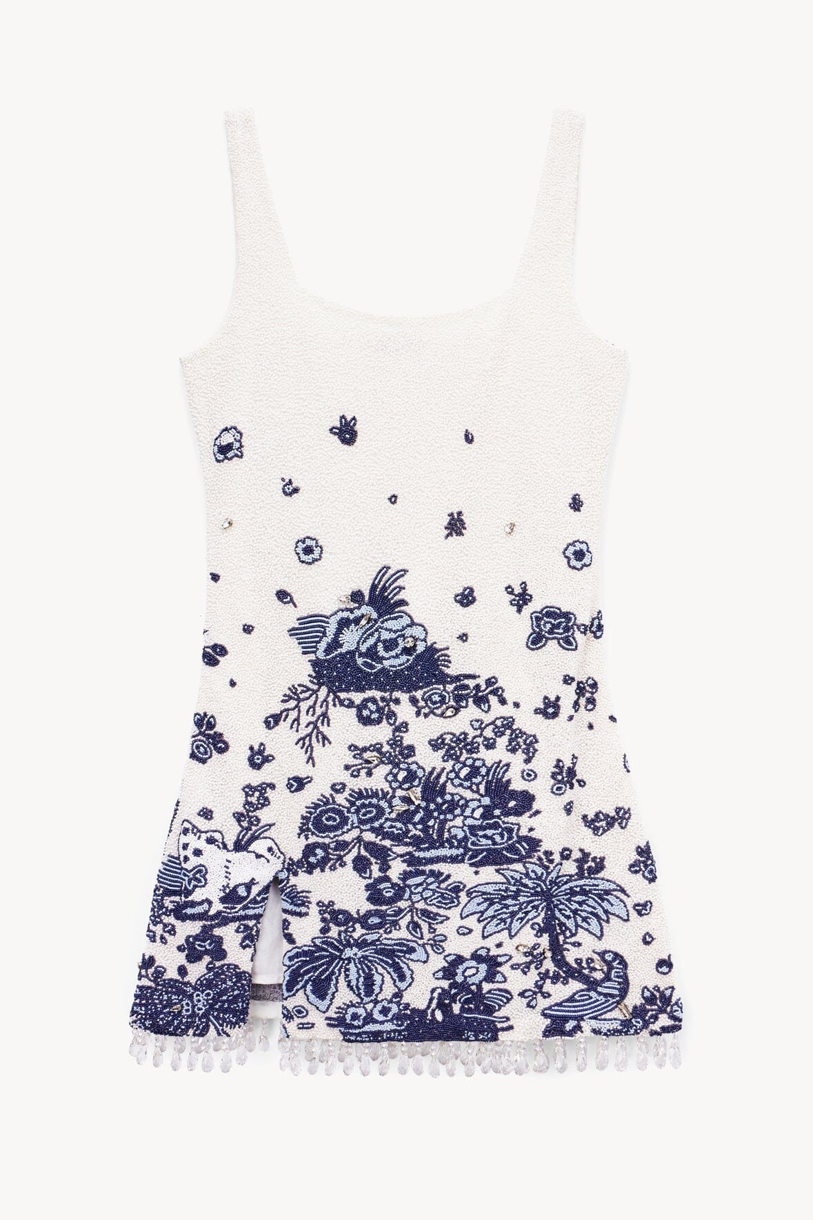 Sleeveless blue toile shift dress, white base, thin straps, tassel-trim hem, split front