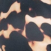 Tortoise print bikini fabric close-up with dark and tan pattern