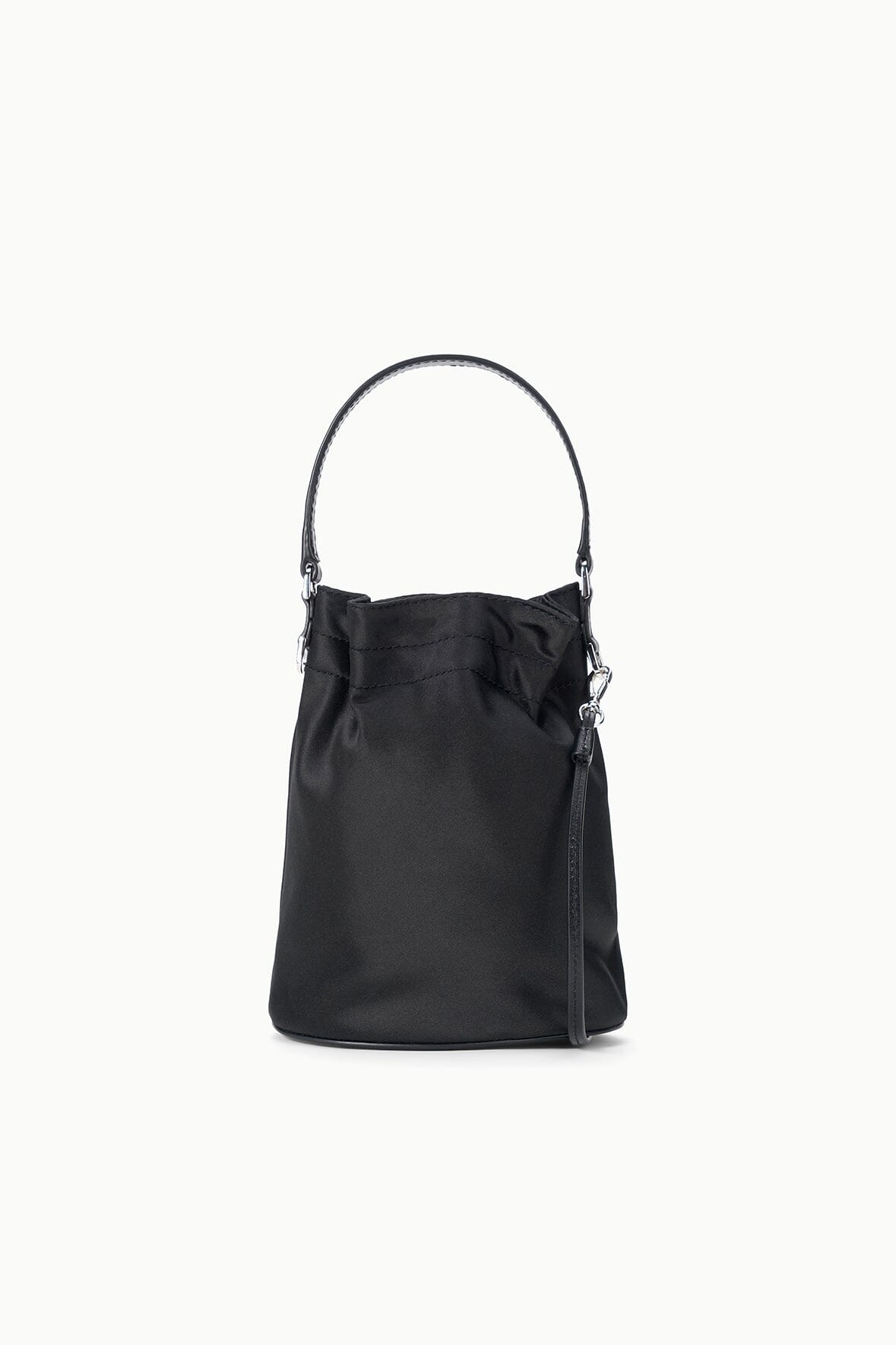 Black mini bucket bag with top handle, drawstring closure, and silver-tone hardware
