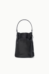 Black mini bucket bag with top handle, drawstring closure, and silver-tone hardware